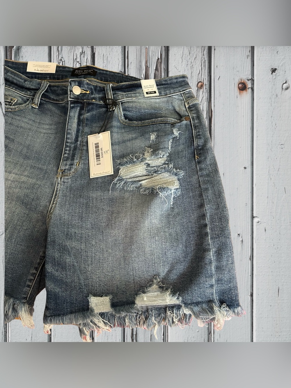 NWT! JUDY BLUE + SIZE SHORTS,MID RISE, DISTRESSED FRINGE HEM, SIZE 3X. MED BLUE. - Picture 15 of 16